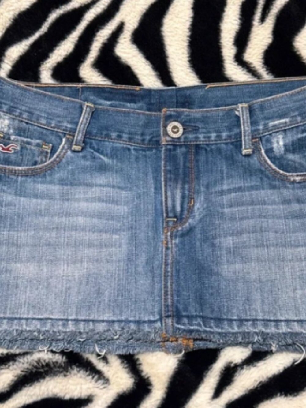 Fashionable fringed denim short skirt